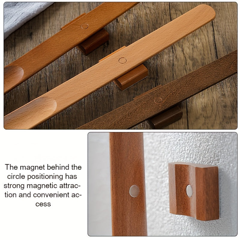 A wooden shoehorn with a long handle 