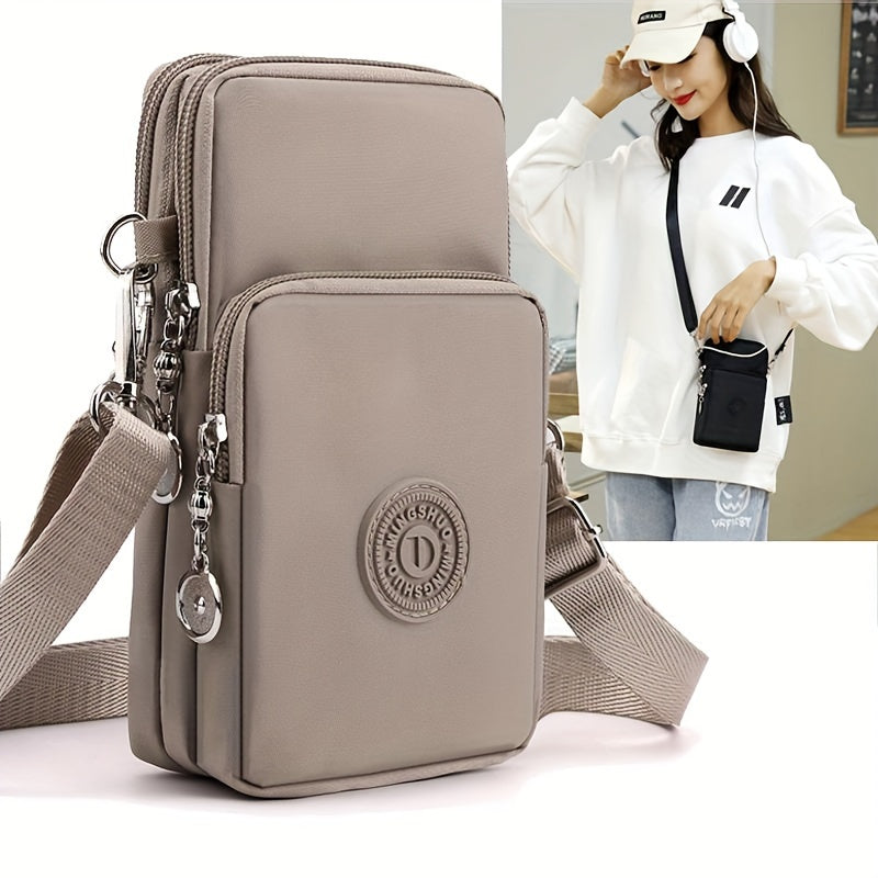 Modern crossbody-telefonväska med läderfoder och dragkedja